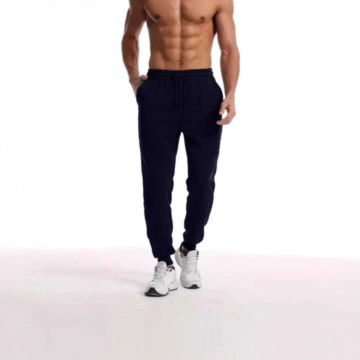 Unisex nan athleisure Jogging trousers with brushed fleece lining, elastic drawstring waistband and ribbed ankle cuffs Drune