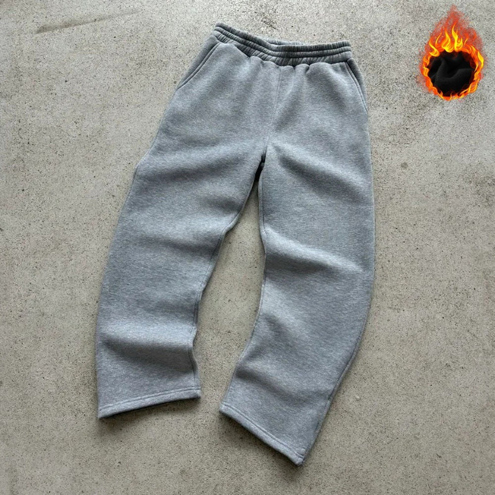 Unisex padded sweatpants with elastic comfort waistband, straight leg and side pockets by Drune