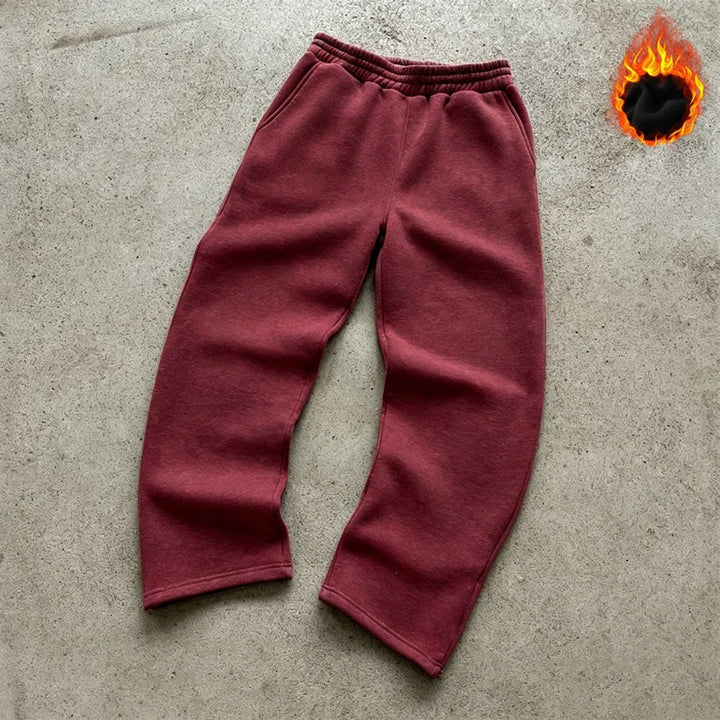 Unisex padded sweatpants with elastic comfort waistband, straight leg and side pockets by Drune