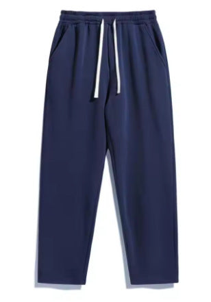 Unisex casual Straight-Leg Jogging Trousers with elastic comfort waistband, contrasting drawstring and side pockets by Drune
