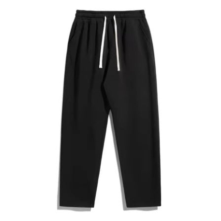 Unisex casual Straight-Leg Jogging Trousers with elastic comfort waistband, contrasting drawstring and side pockets by Drune