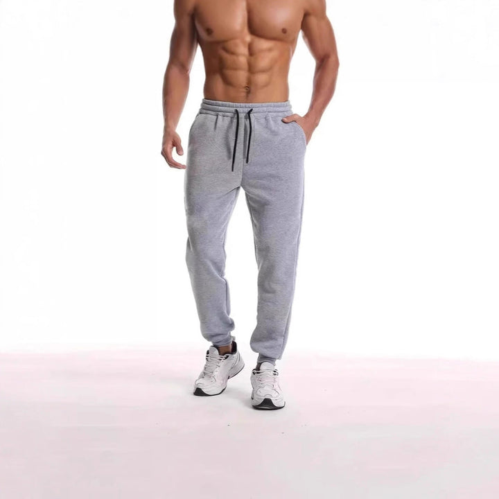 Unisex nan athleisure Jogging trousers with brushed fleece lining, elastic drawstring waistband and ribbed ankle cuffs Drune