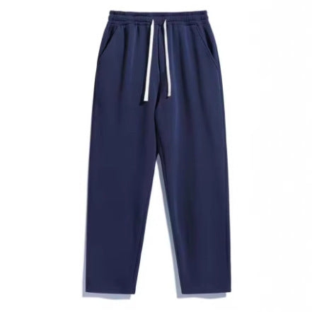 Unisex casual Straight-Leg Jogging Trousers with elastic comfort waistband, contrasting drawstring and side pockets by Drune