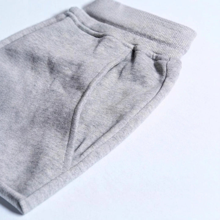 Unisex nan athleisure Jogging trousers with brushed fleece lining, elastic drawstring waistband and ribbed ankle cuffs Drune
