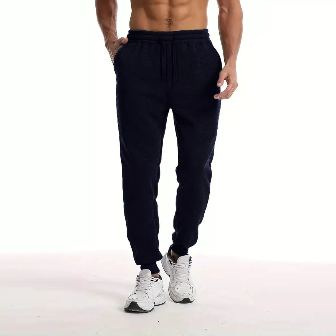 Unisex nan athleisure Jogging trousers with brushed fleece lining, elastic drawstring waistband and ribbed ankle cuffs Drune
