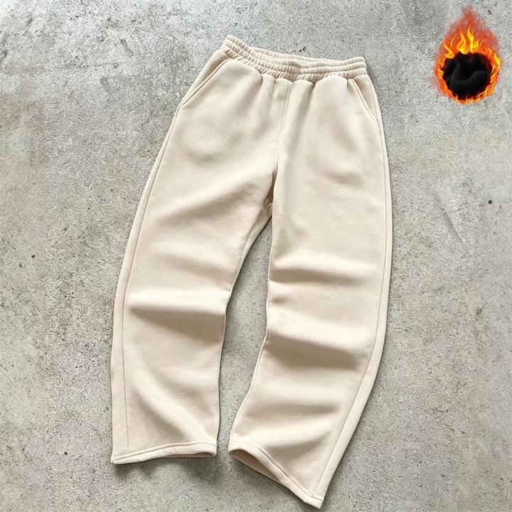 Unisex padded sweatpants with elastic comfort waistband, straight leg and side pockets by Drune