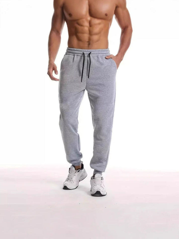 Unisex nan athleisure Jogging trousers with brushed fleece lining, elastic drawstring waistband and ribbed ankle cuffs Drune