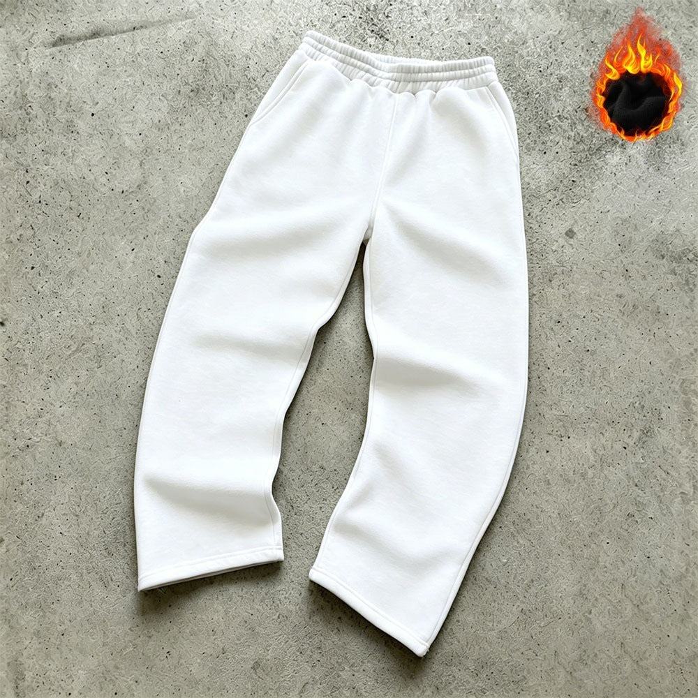 Unisex padded sweatpants with elastic comfort waistband, straight leg and side pockets by Drune