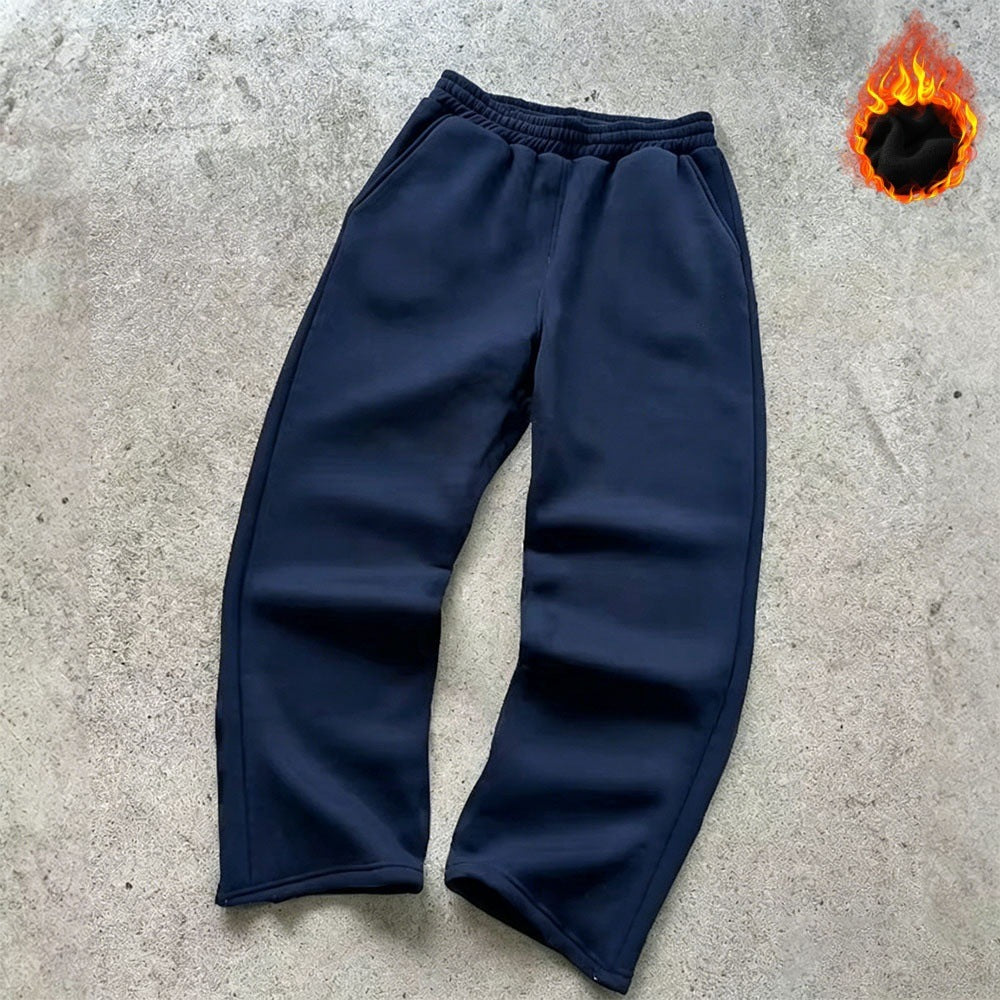 Unisex padded sweatpants with elastic comfort waistband, straight leg and side pockets by Drune