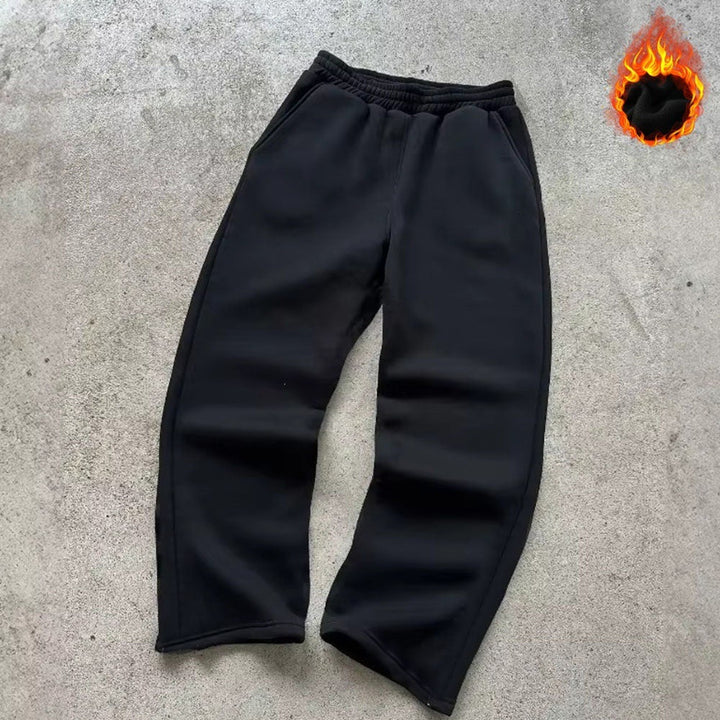 Unisex padded sweatpants with elastic comfort waistband, straight leg and side pockets by Drune