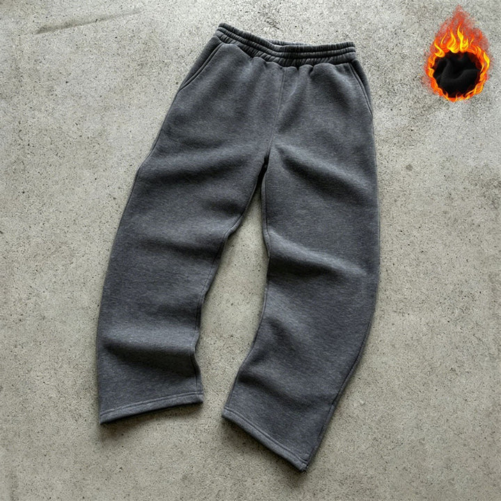 Unisex padded sweatpants with elastic comfort waistband, straight leg and side pockets by Drune