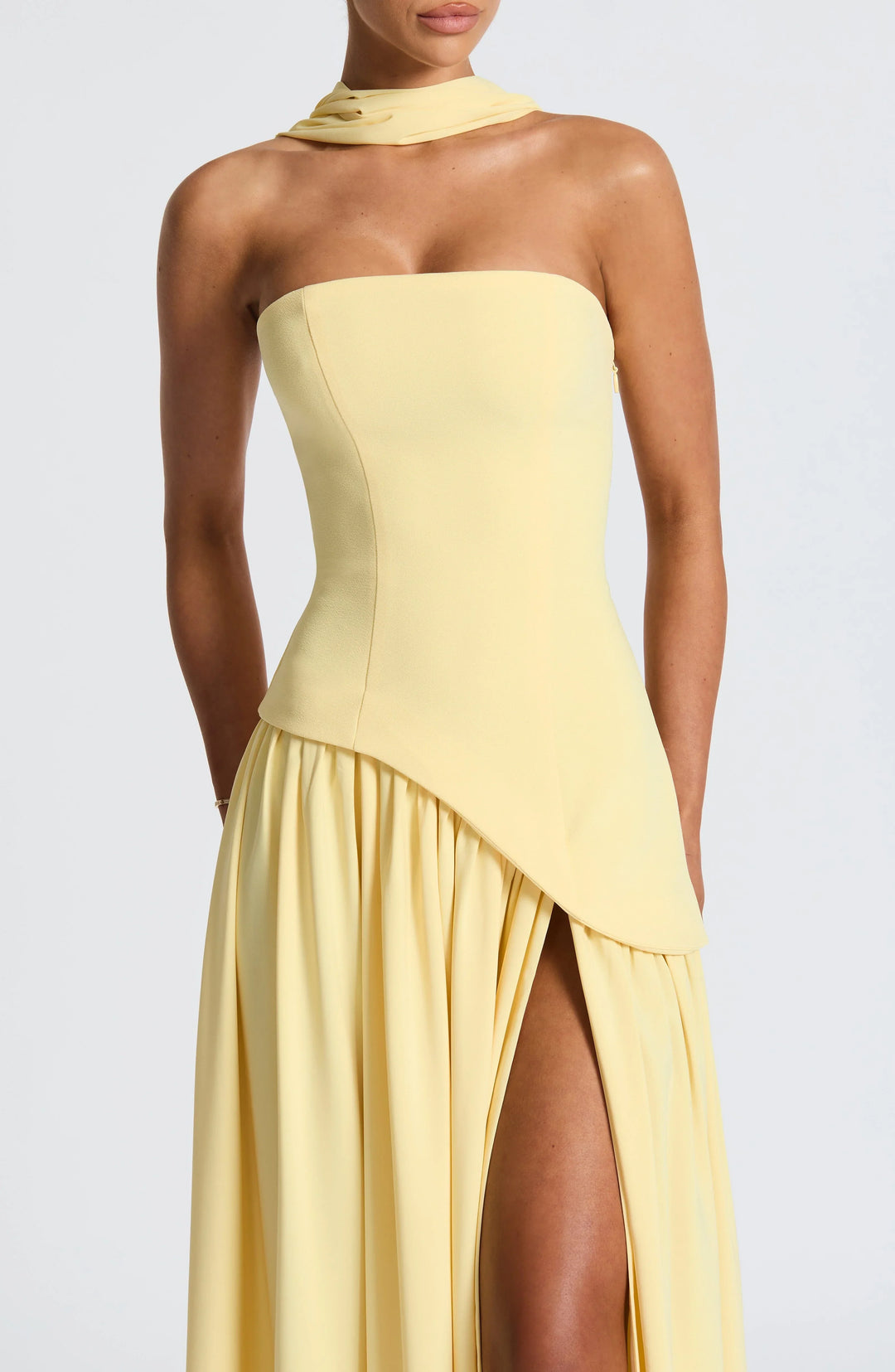 Long strapless corset dress with scarf detail and high slit